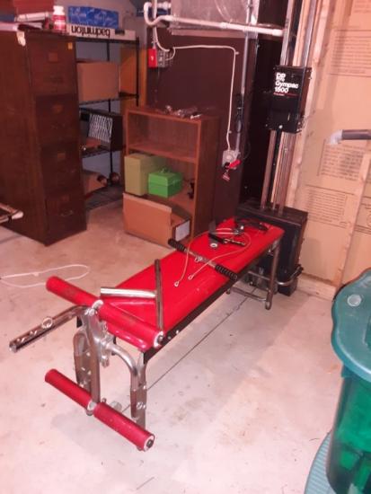 Full workout bench w accessories.