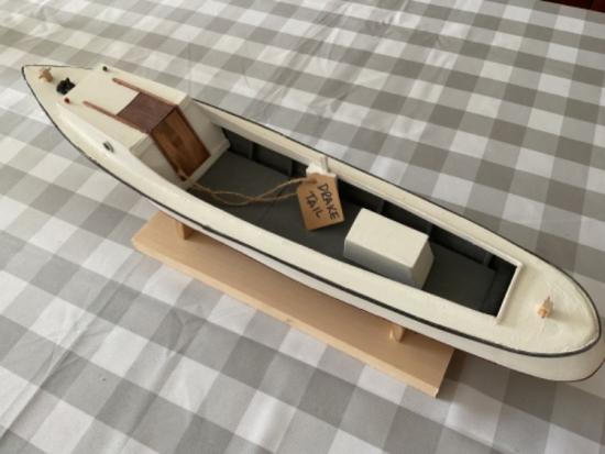 Wooden, custom, handmade Draketail boat.